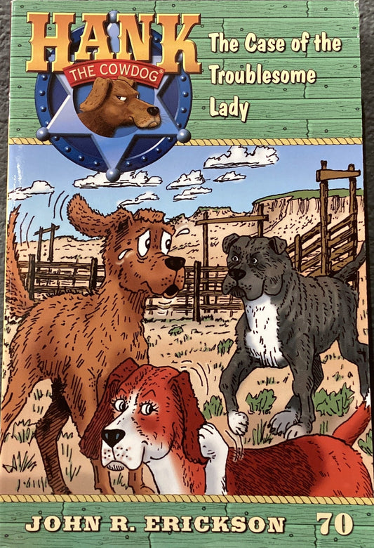 Book cover of 'Hank the Cowdog: The Case of the Troublesome Lady' by John R. Erickson on a dark surface.