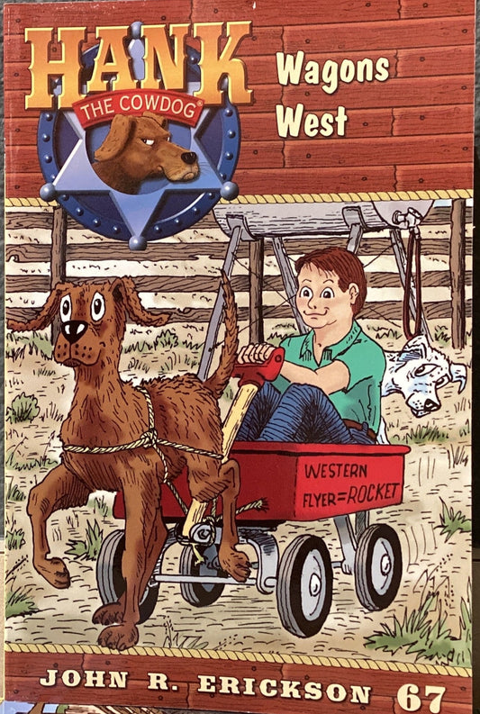 Book titled 'Hank Wagon West' by John R. Erickson on a table with a dark gray wall background.