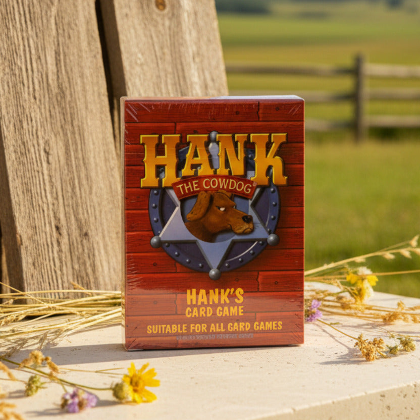 Packaging for 'HANK THE COWDOG' card game featuring a brown bear character illustration.