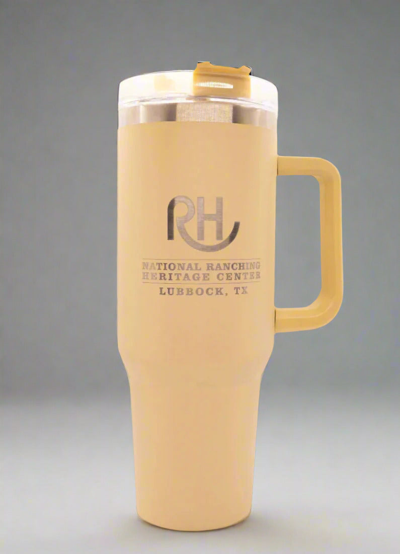 A beige colored tumbler with a straw and handle, featuring the 'RH' logo, indicative of the Ralph Lauren brand.