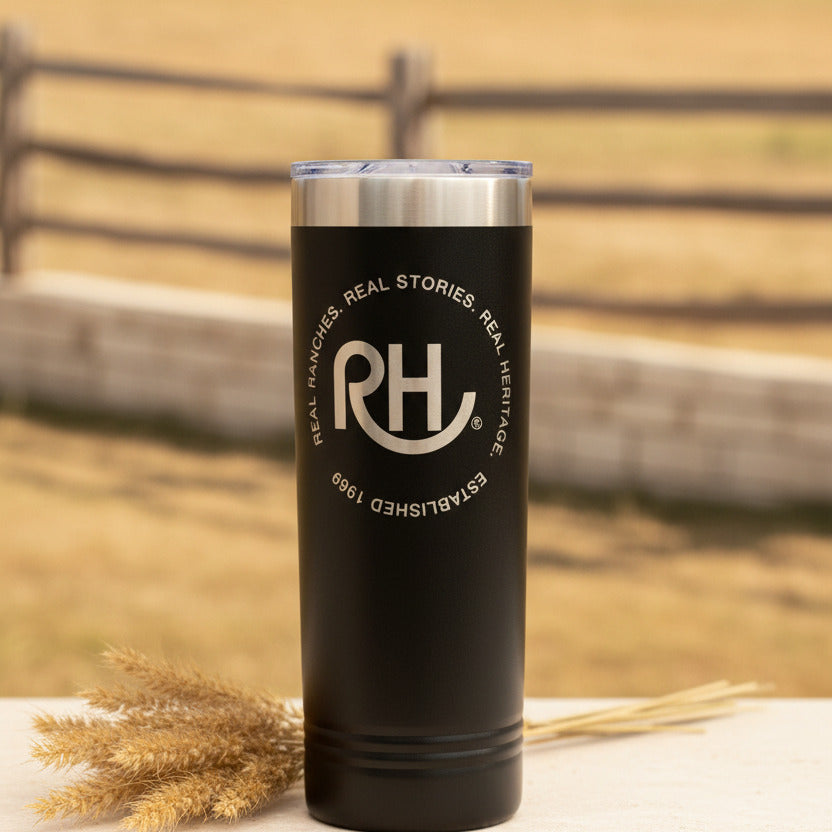 A tall black metal tumbler with the 'RH' logo printed on it.