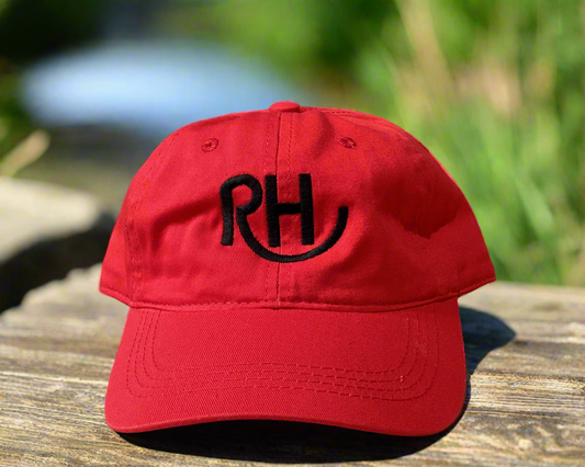Red cap with 'RH' logo on a white background