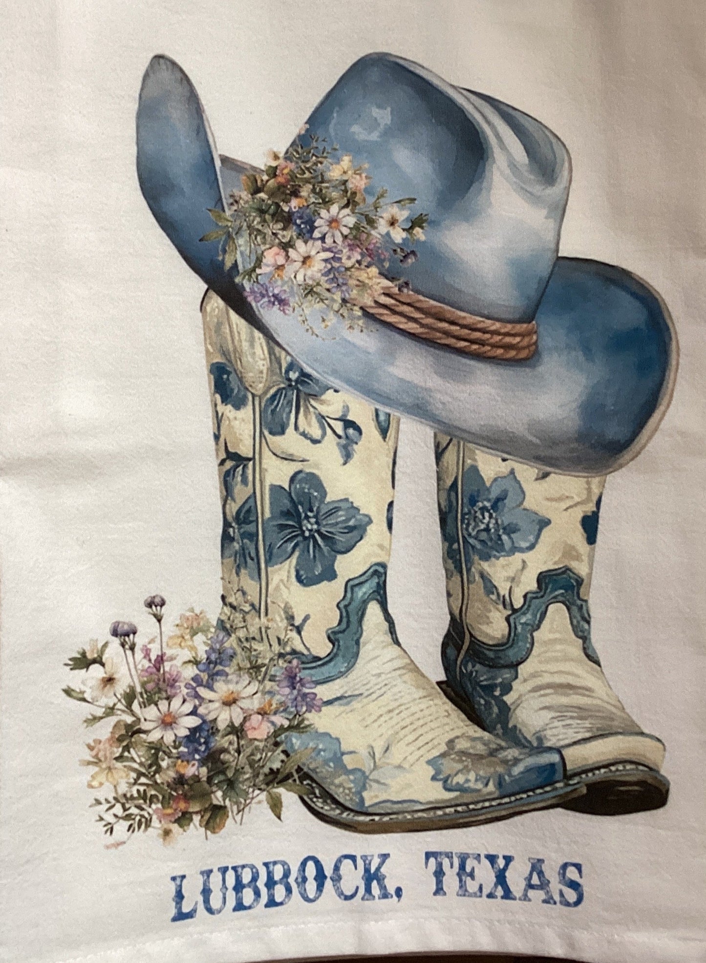 Towels with cowboy boots and a hat design, featuring the text 'Lubbock, Texas'.
