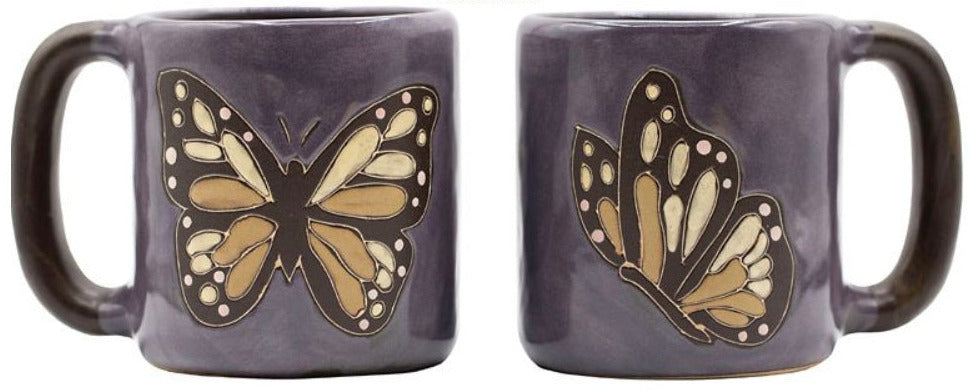Two purple mugs with butterfly designs on a white background
