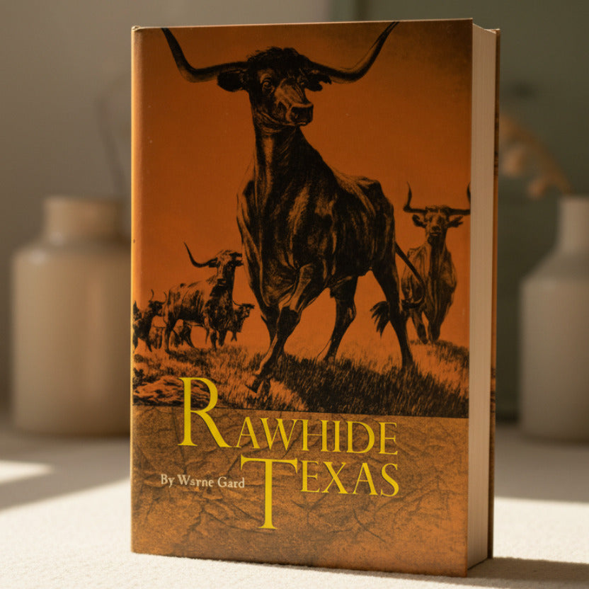 Book cover of 'Rawhide Texas' with a longhorn cow and other animals on an orange background