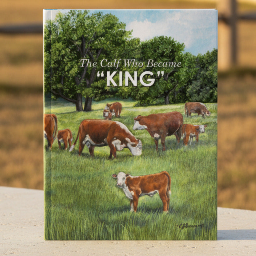 Book cover with illustration of cows in a field and text 'The Calf Who Became KING'.