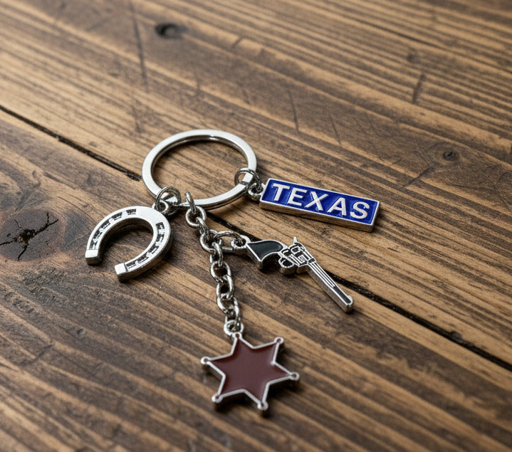 Keychain with charms on a beige surface