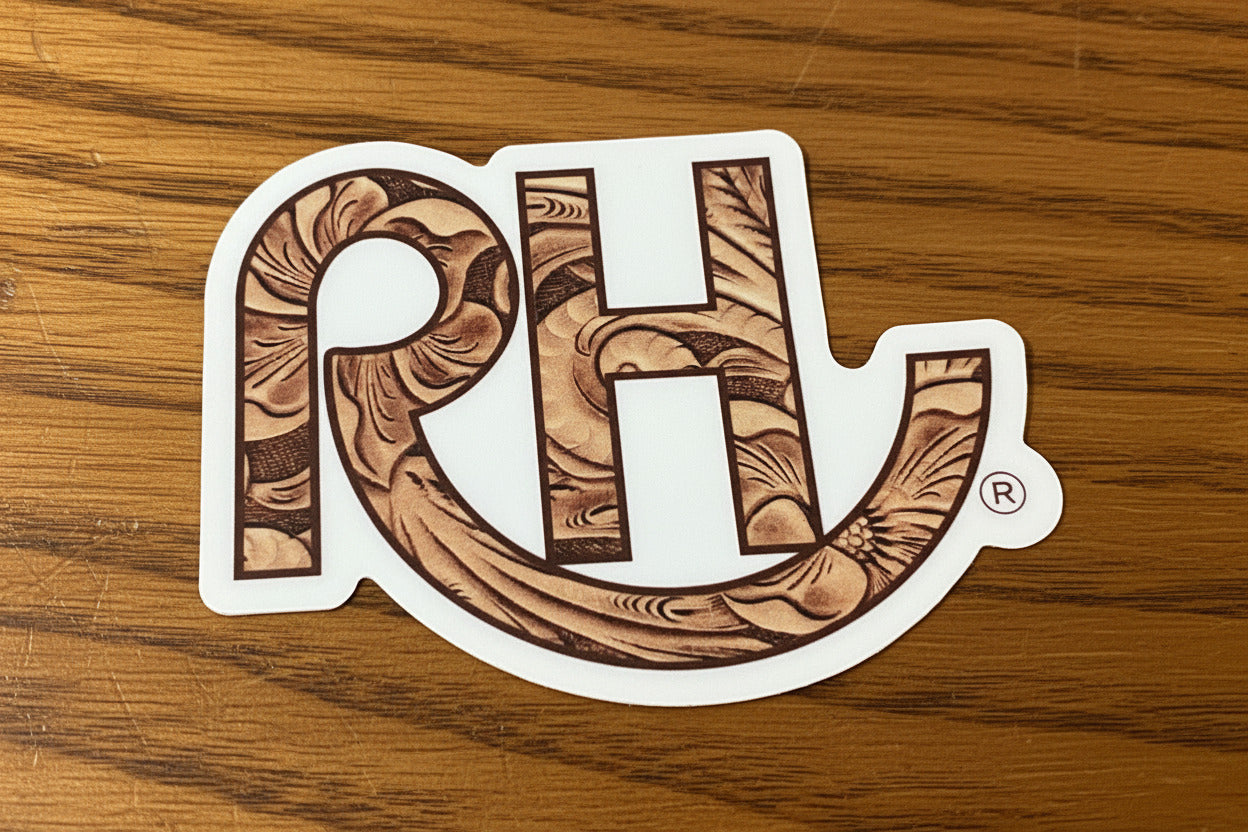 Wooden surface with a 'RH' logo sticker