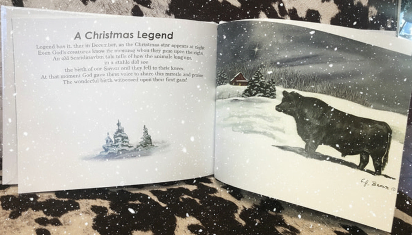 Open book with a Christmas-themed illustration of a cow in a snowy landscape.