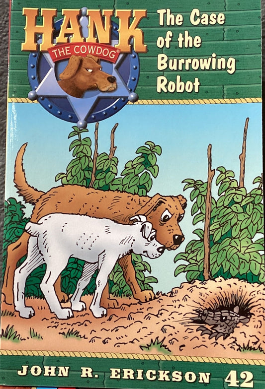 Children's book titled 'Hank the Cowdog: The Case of the Burrowing Robot' by John R. Erickson on a gray surface.