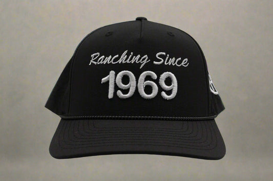Black cap with 'Ranching Since 1969' text on a white background