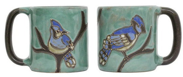 Two ceramic mugs with bird design on a white background
