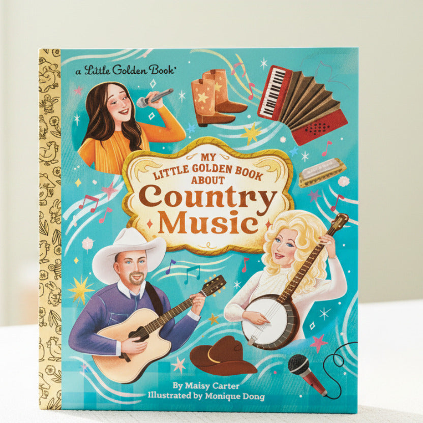 Front cover of the children's book 'My Little Golden Book About Country Music' by Maisy Carter, illustrated by Monique Dong. The cover features colorful cartoon illustrations of country music themes, including a woman singing with a microphone, cowboy boots, an accordion, a harmonica, a banjo, a guitar, and another woman playing a banjo.