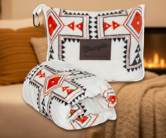 Travel blanket with geometric pattern and 'Wrangler' branding on a white background